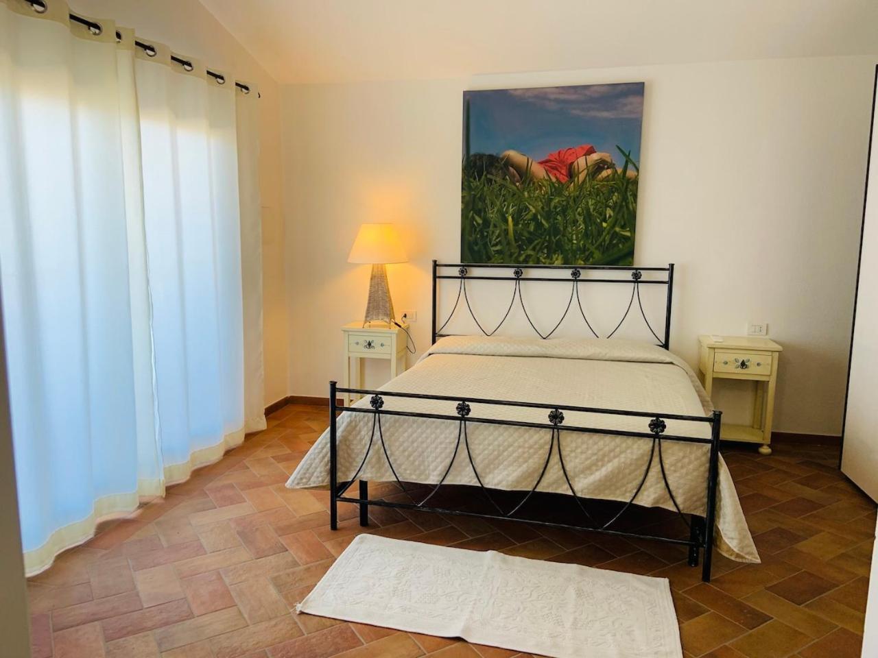 Residence Le Onde Badesi Pokoj fotografie