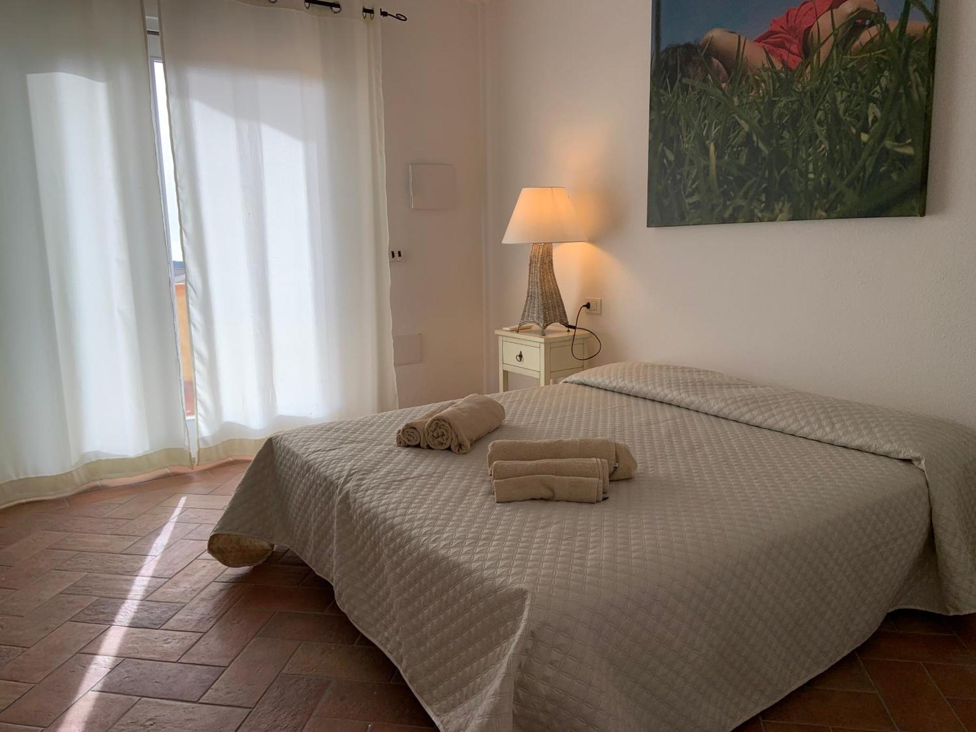 Residence Le Onde Badesi Pokoj fotografie